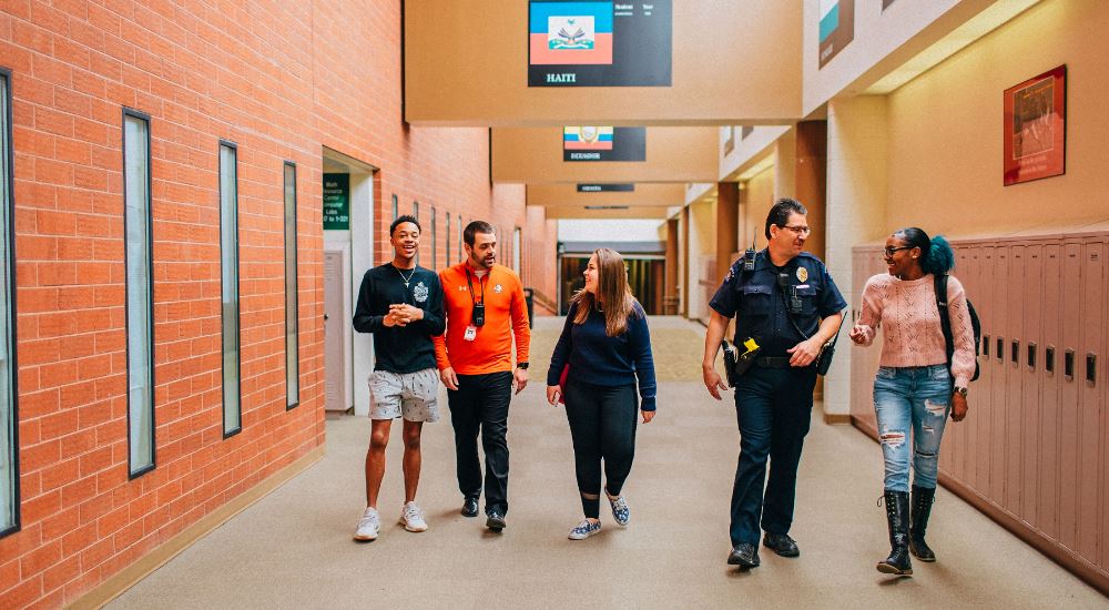 SRO and security personnel interact with students at Smoky Hill HS. SRO and security personnel interact with students at Smoky Hill HS.