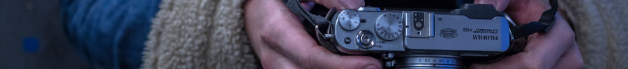 Person holding a camera 