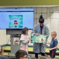  Students meeting author Saki Tanaka at Buffalo Trail Elementary School