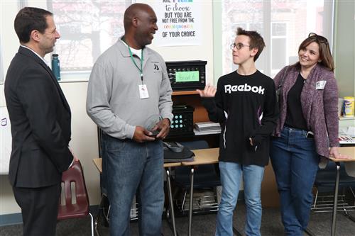 CCSD Hero Award Recipient Dwayne Johnson with Superintendent Scott Siegfried and student at Joliet Learning Center. 