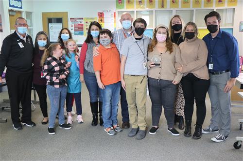 Brittany Peitersen and students, staff and colleagues at Falcon Creek Middle School.
