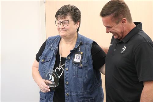 Kim Kilgore receiving the award